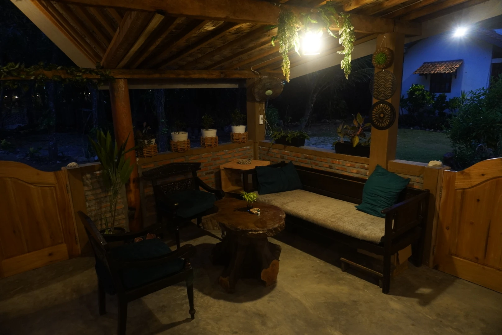 Outdoor seating area at Krui Surf Camp beachfront
